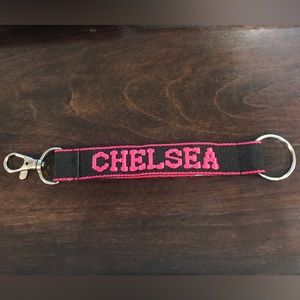 Chelsea wristlet/keychain black and pink.